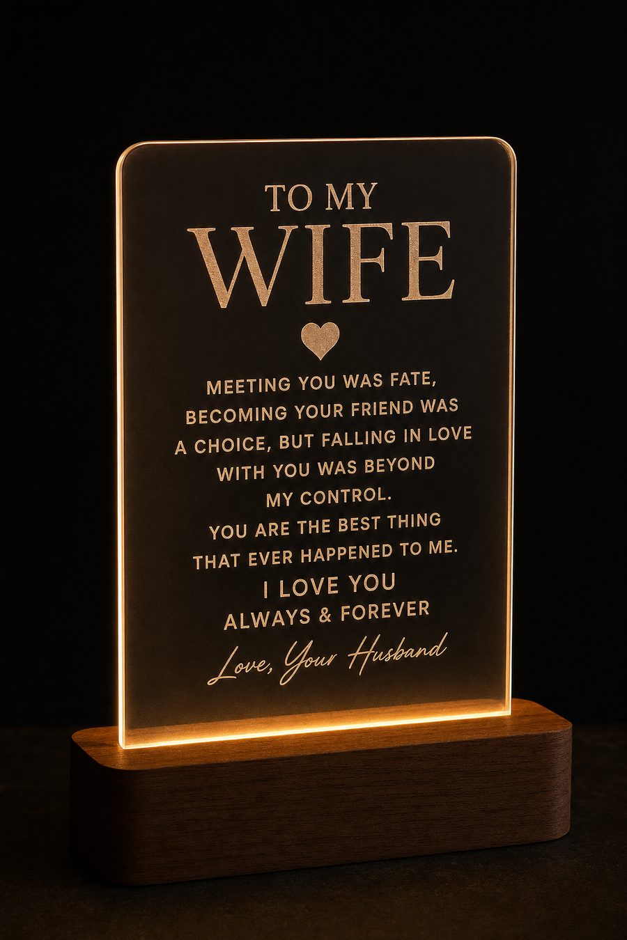 Frosted acrylic plaque glowing on a walnut LED base